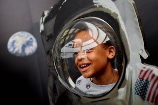 Child in spacesuit in the Rocket Tower